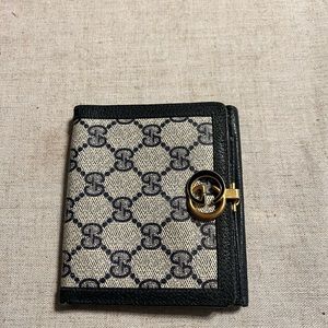 Used Gucci wallet blue purchased years ago when Gucci was in demand it’s real